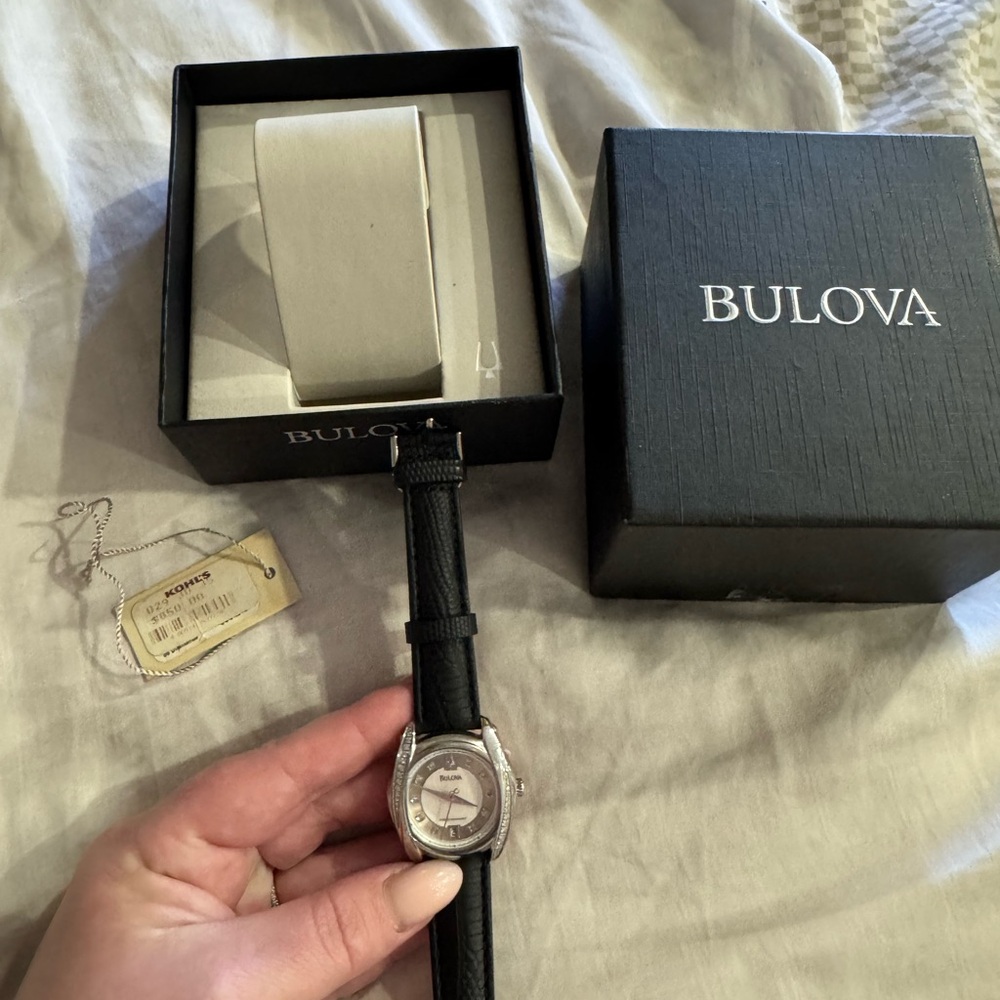 Bulova Silver women’s watch with real diamonds. Very good conditions like new
